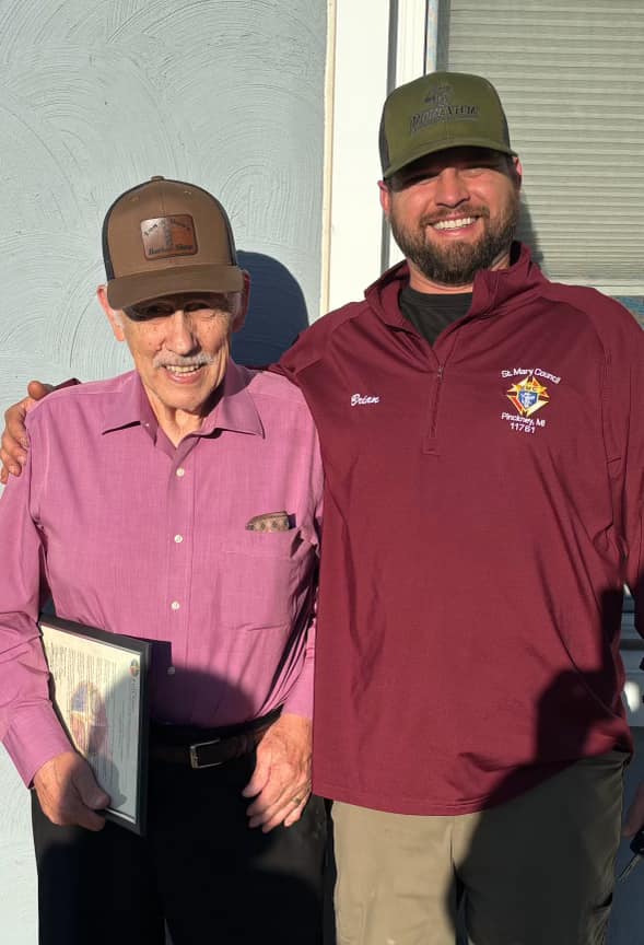 Brian with a community member